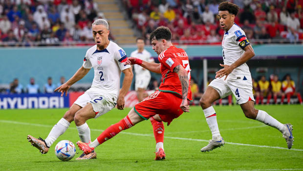 Sergino Dest and Tyler Adams playing for the U.S. at the World Cup.